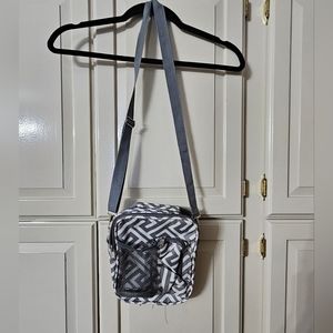 Spacious crossbody white and gray purse